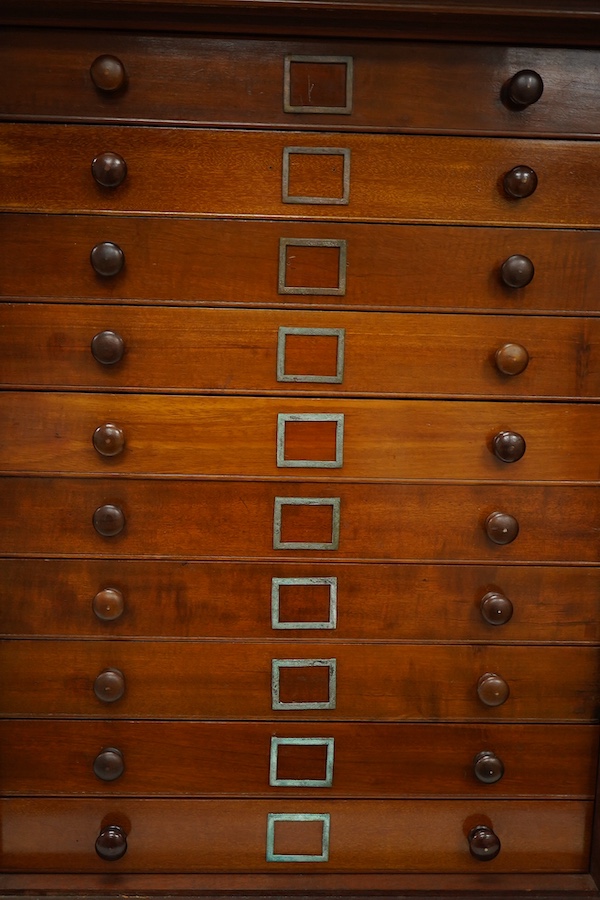 A Victorian mahogany 10-drawer collector’s cabinet with arched glazed door, height 68cm, width 54cm, depth 53cm, containing prepared and pinned moth and butterfly specimens, together with seven 1940s volumes of the Proce